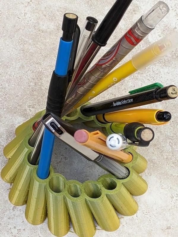 Hyperboloid office pencil and pen holder