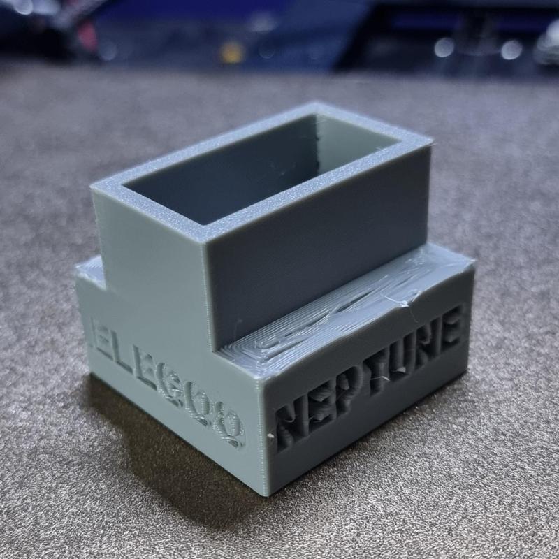Elegoo Neptune 3 Squash ball feet.