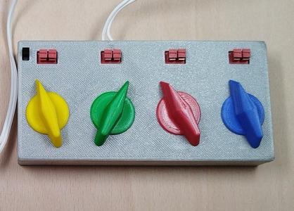 Modular control panel for wooden train components.