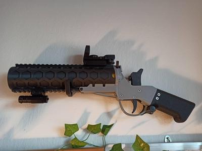 Co2 rocket launcher wall hanger
