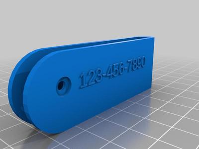 Compact keyholder keyring with label