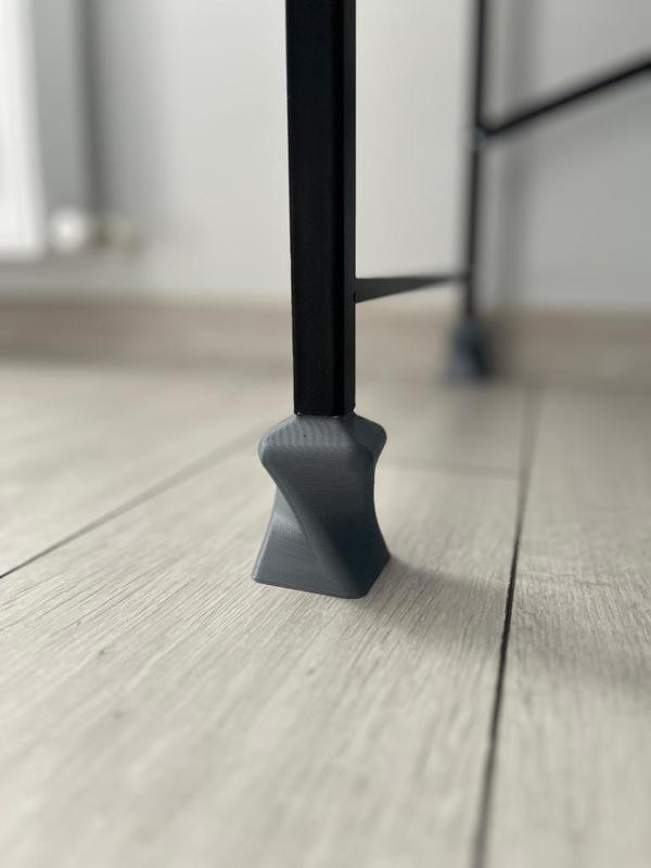 Desk leg raising bracket