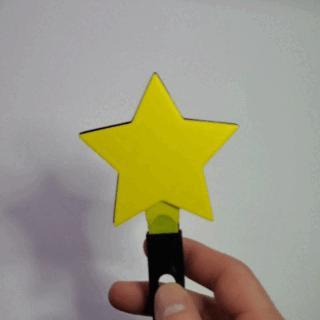 Star-Shaped Clapper Noisemaker Toy :: Classic Novelty Party Favor