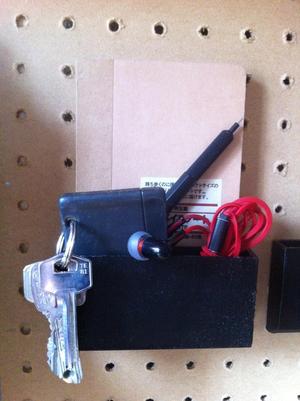 Notebook and keys pegboard container