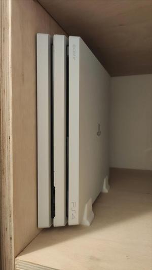 PS4 Pro vertical stand close to the wall