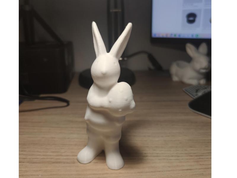 Standing Easter Bunny Holding an Egg