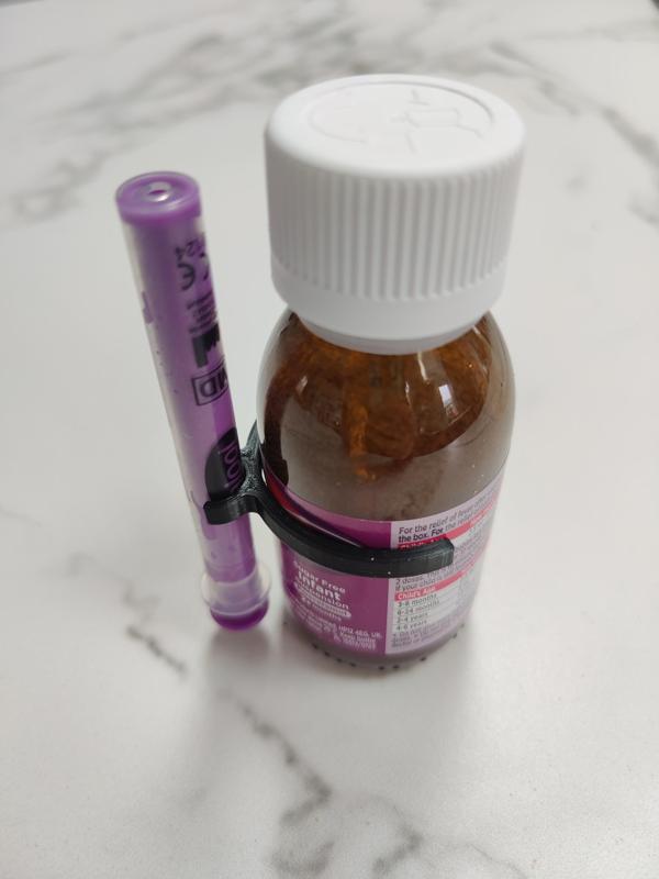Calpol bottle and syringe clip