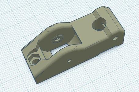 Y belt tensioner with bolt axle and front adjustment