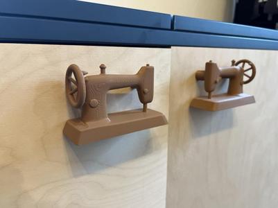 Sewing cabinet door handles