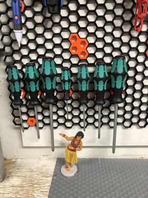 Honeycomb wall screwdriver holders