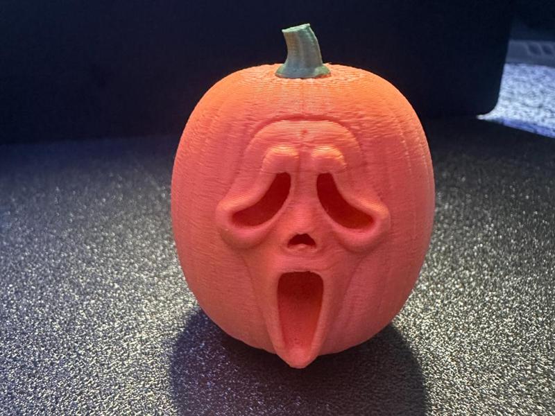 Halloween Pumpkin in the form of a scary movie