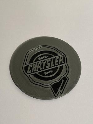 Chrysler badge for wheel chock