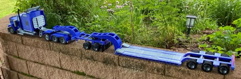 Triple axle heavy haul trailer plus 2 versions of the jeep