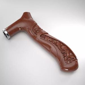 Cane-handle ornately carved wooden handle