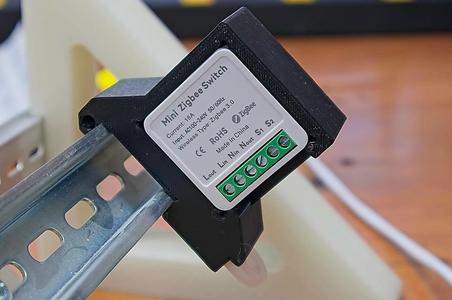 DIN rail mount for a mini zigbee switch