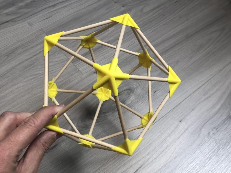 Icosahedron with wooden stick