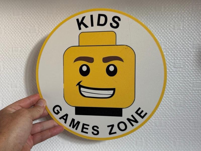 Kids Games Zone sign - brick
