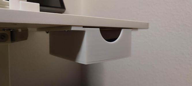 Space-saving drawer under the table