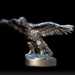 eagle on the hood of a car