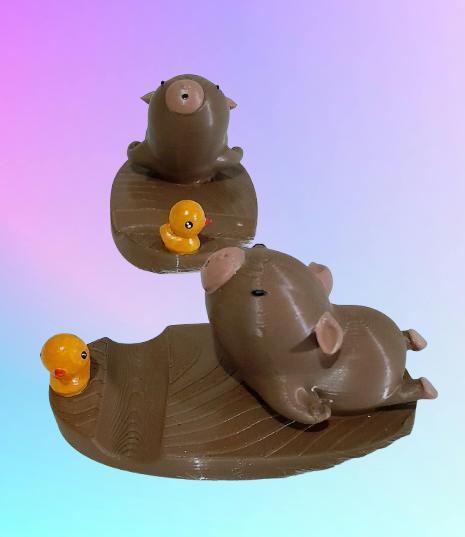 Capybara cell phone holder with duckling