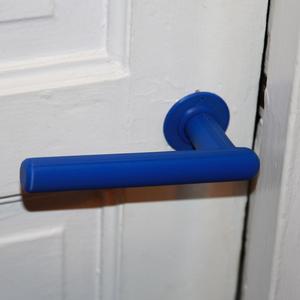 Tube style door handle