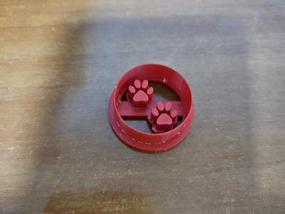 Cutter with dog paw prints