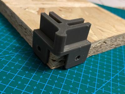 Angled grid connector with holes