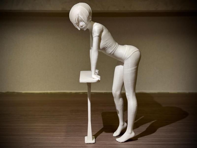 The teacher leaning on the table