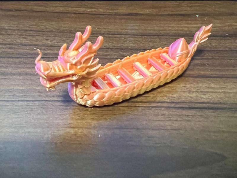 Celebrating Dragon Boat Festival--Rice Dumpling Dragon Boat