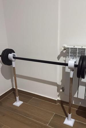 Apoya barra de mancuerna 