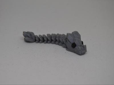 Little articulated stone dragon