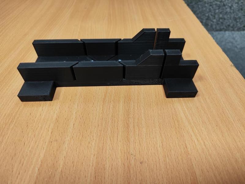 Miter box with additional supports.