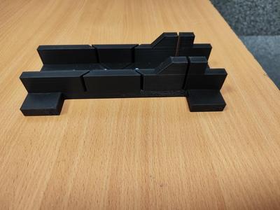 Miter box with additional supports.