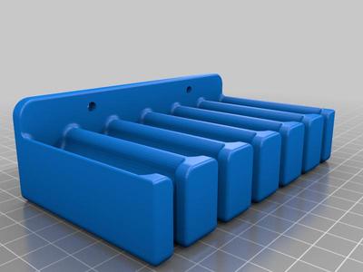 Wall-mounted cable organizer