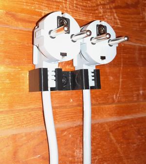 Fixture for two electrical cords