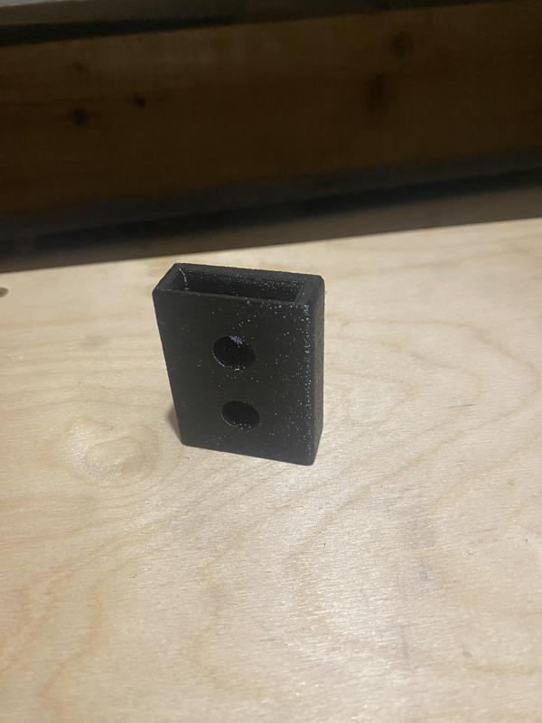 nástěnný držák na svinovací metr univerzání/universal tape measure wall holder