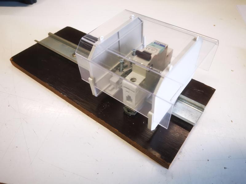 Tamper-proof DIN rail enclosure kit