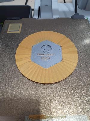 Replica of the Olympic gold medal