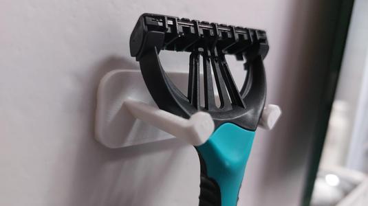 Soporte para colgar la maquinilla de afeitar