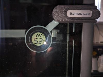 Hygrometer mount glass door