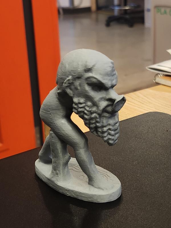 Sculpture of a Young Satyr with Mask