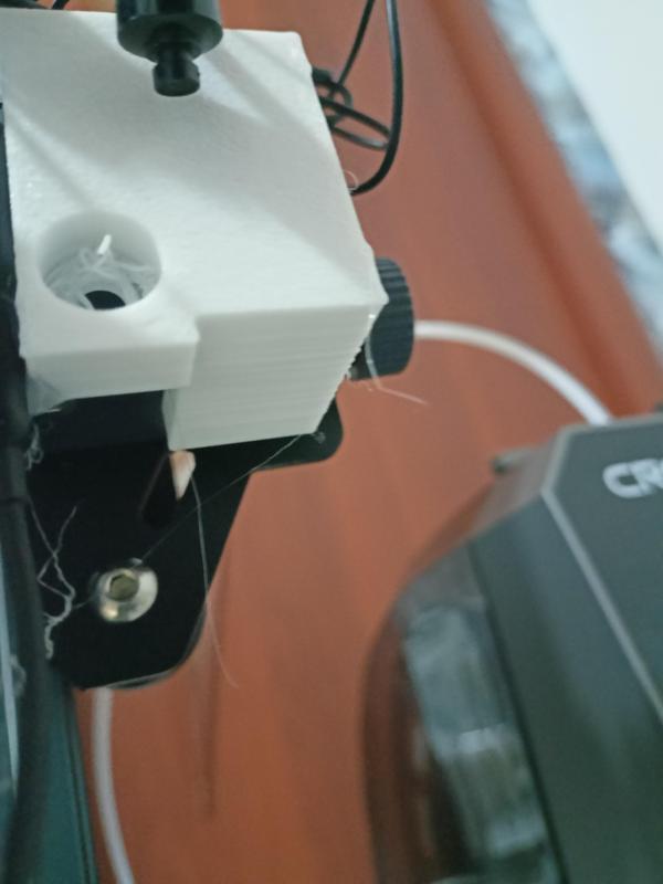 Headphones trigger for shooting time-lapse photography mount for elegoo neptune 4 pro.  printed with white PETG plastic