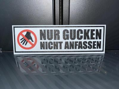 Funny sign: Look only...