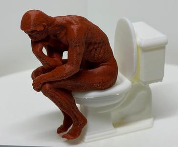 The Stinker Thinker Spinning Man on Toilet