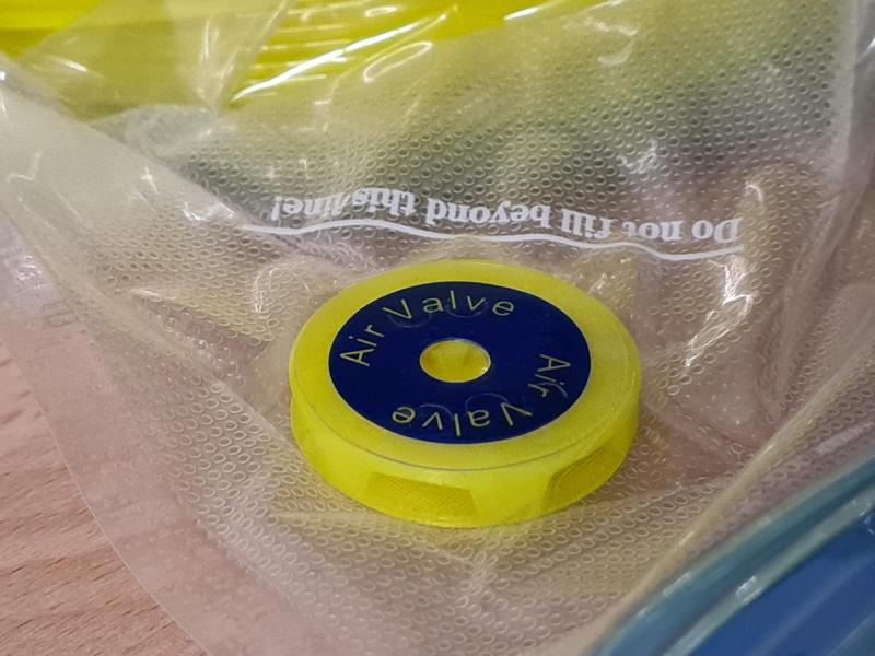 Vacuum bag valve spacer