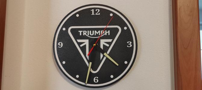 Triumph Clock flat
