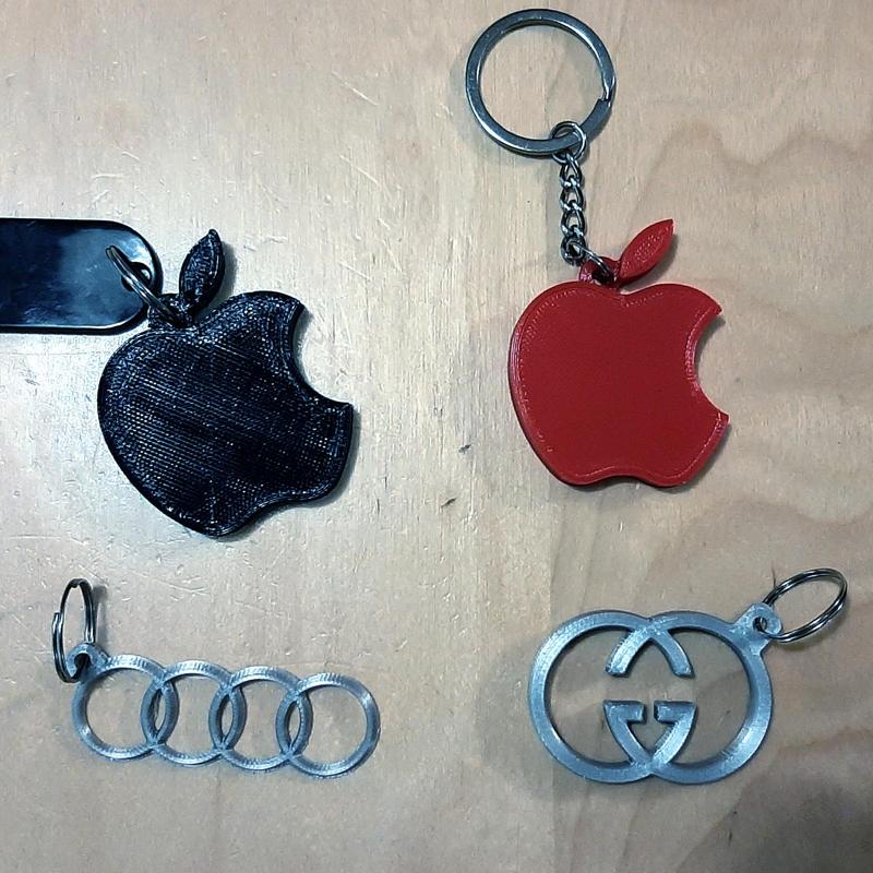 Brand logos keychain, Apple, Audi, Gucci