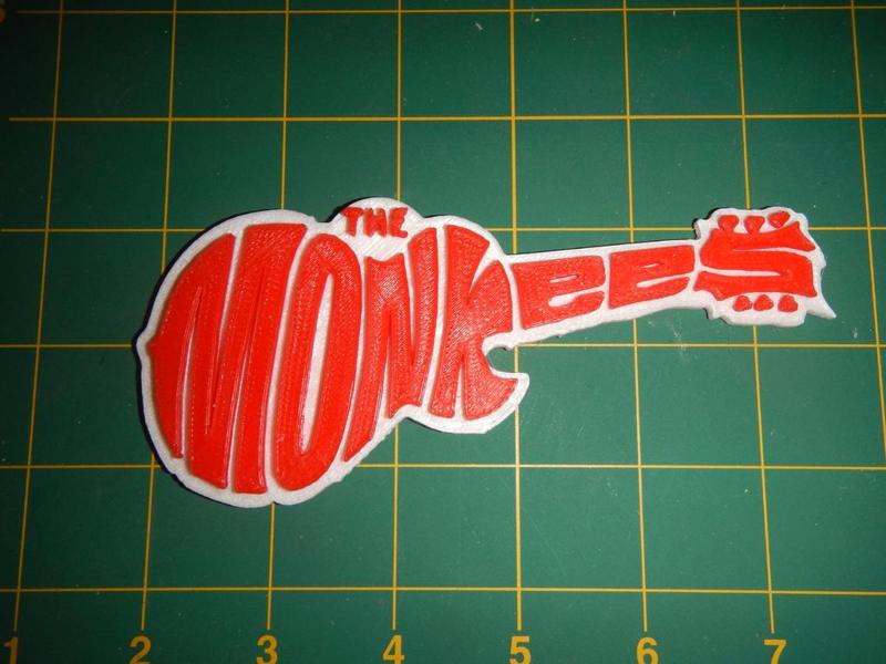 Monkees Guitar Logo