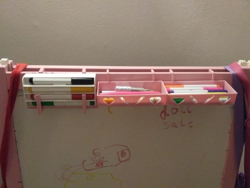 to the board for the sponge and markers