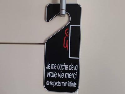 Humorous 'Do Not Disturb' Door Hanger